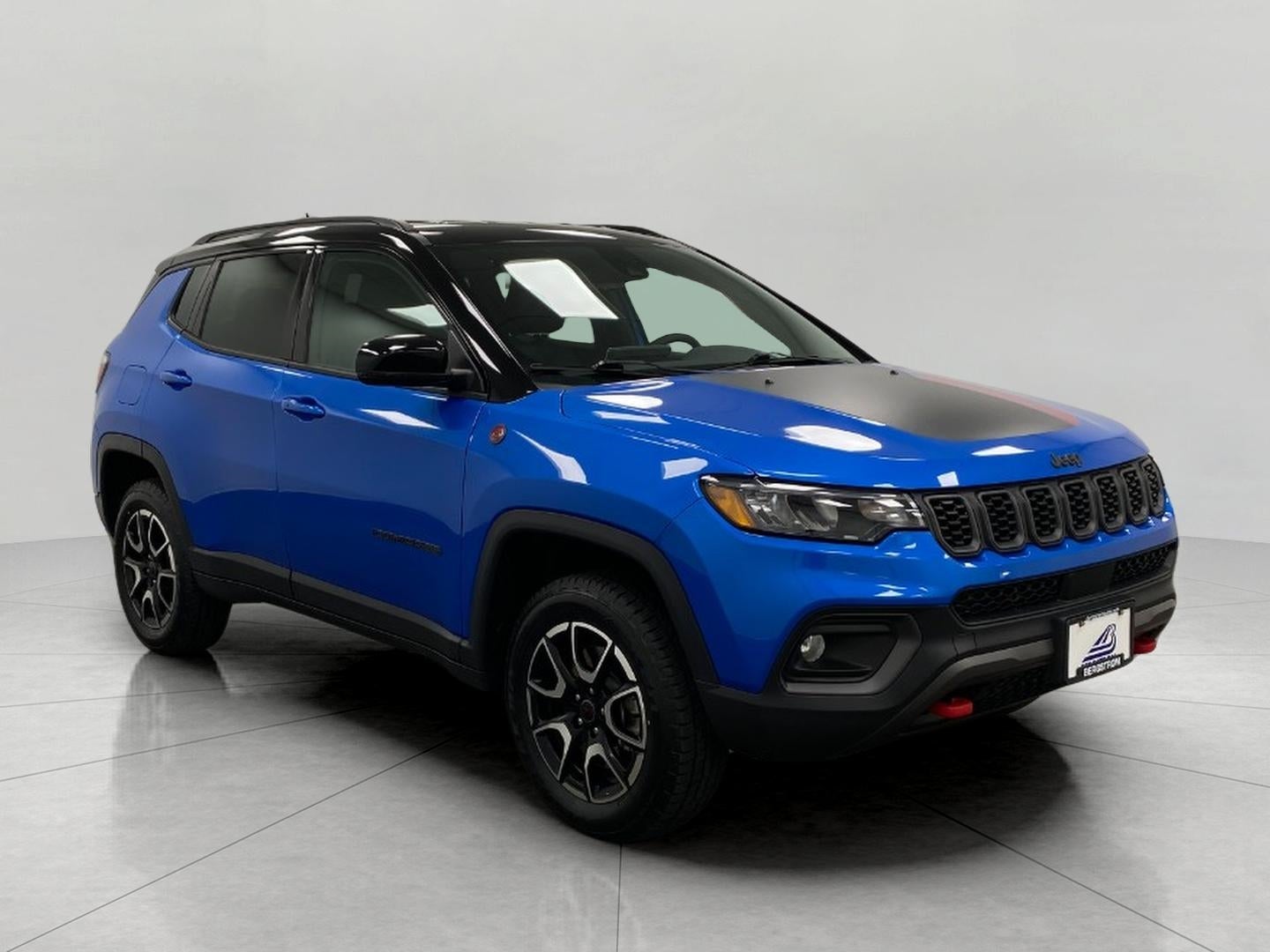 2025 Jeep Compass Trailhawk 4x4 in Hydro Blue Pearlcoat — front three-quarter view